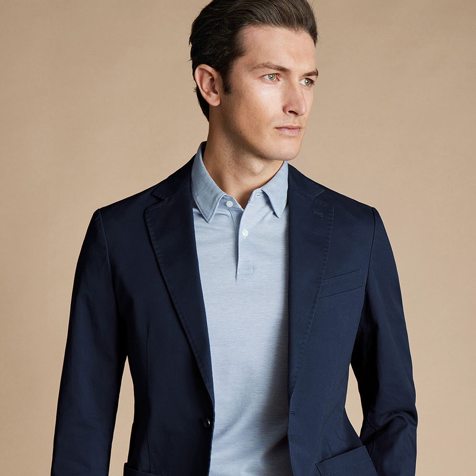 cotton stretch navy suit jacket as casual wedding attire idea for men