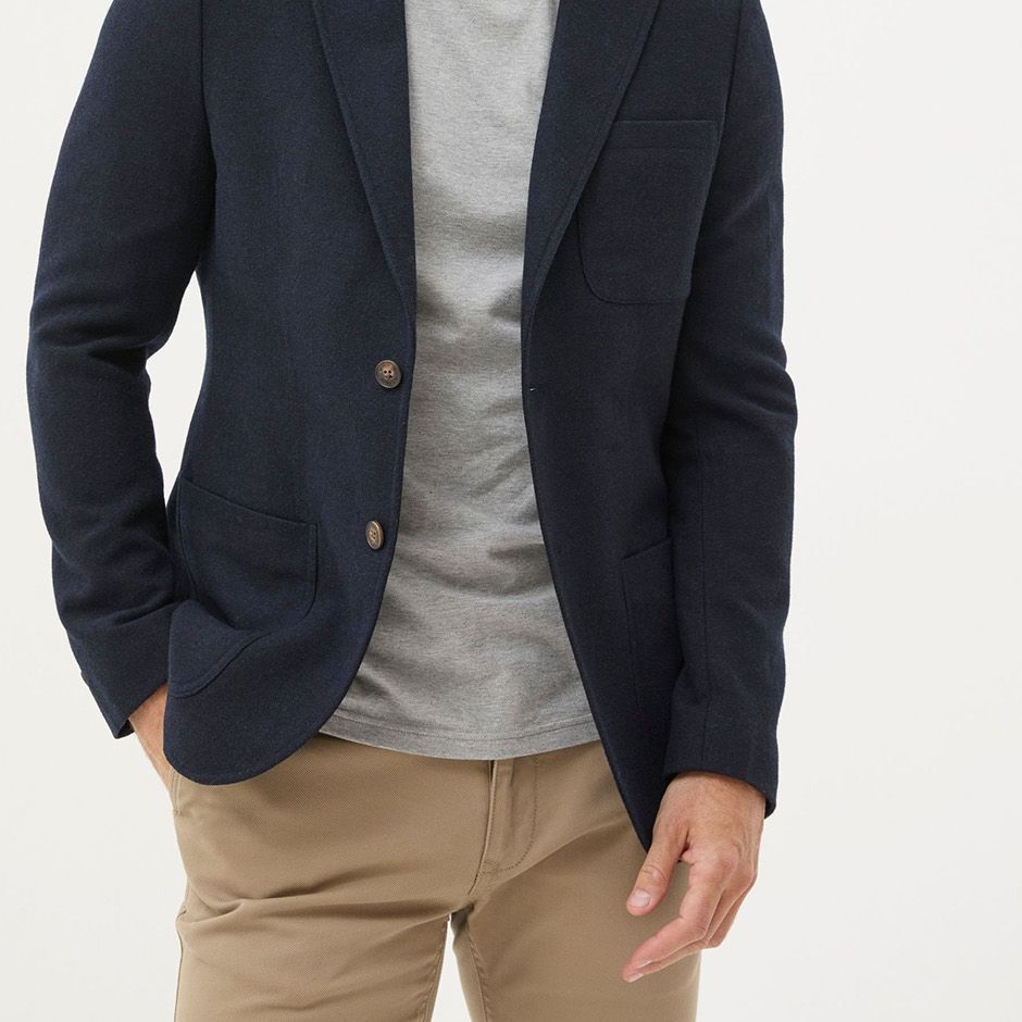 navy wool blazer as casual wedding attire idea for men