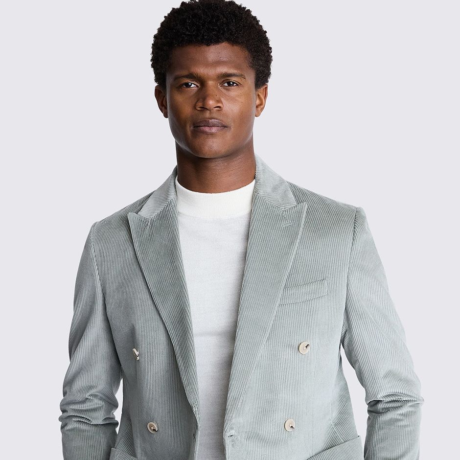 tailored fit corduroy suit in sage colour as casual wedding attire outfit idea for men