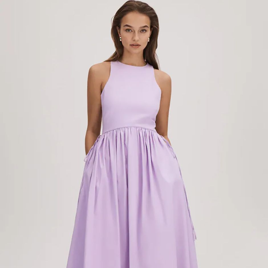 casual wedding guest dress in lilac with midi length and full-bodied skirt