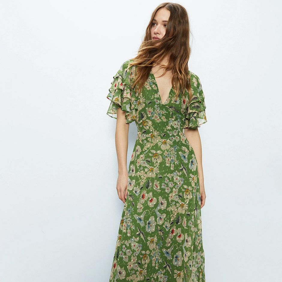 casual wedding guest dress in green floral print in lightweight chiffon fabric with ruffled trim