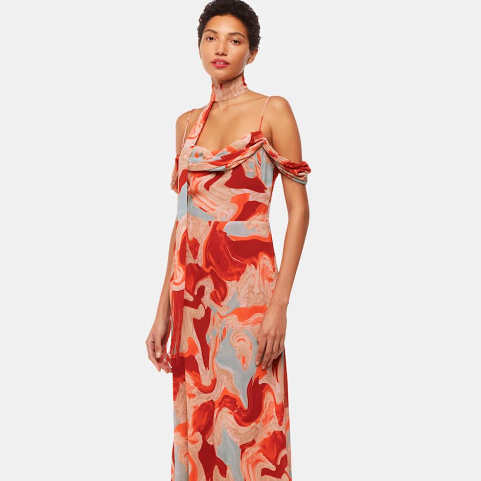 casual wedding guest dress in red multi marble print with cold shoulder neckline