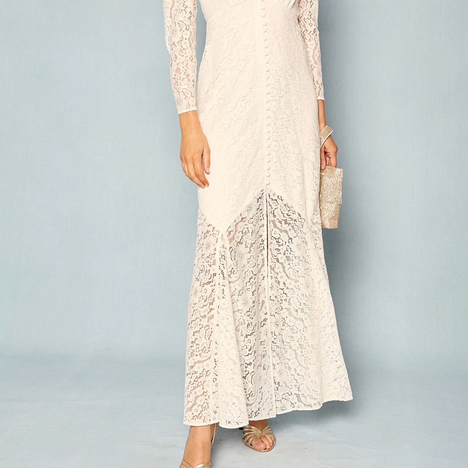 vintage style lace wedding dress with empire waist, v neck, slender sleeves and fit-and-flare shape.