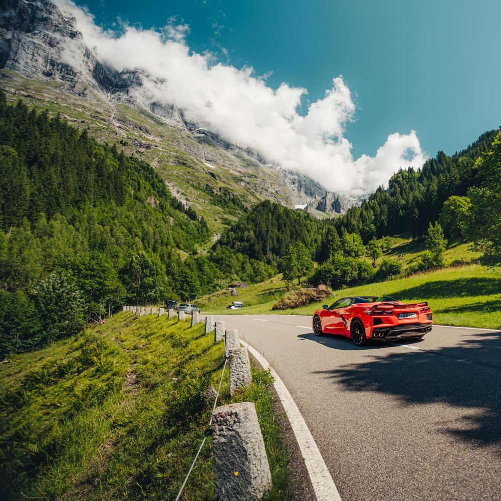 HunterMoss with luxury sports cars