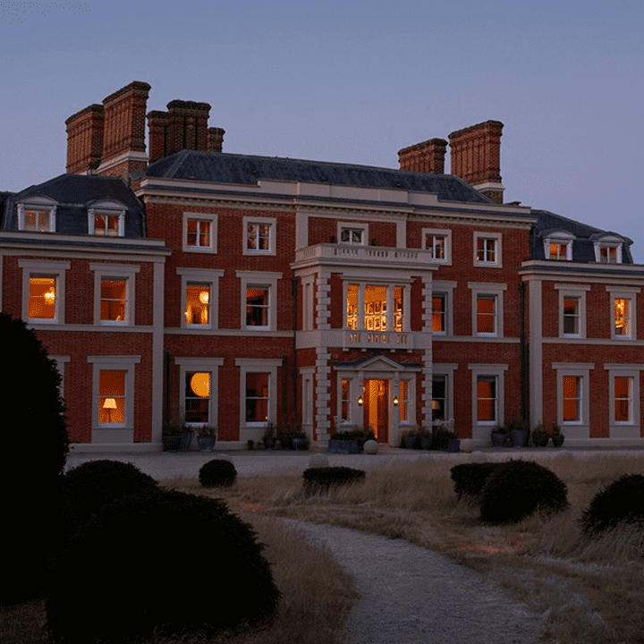 Exterior of Heckfield Place in the evening