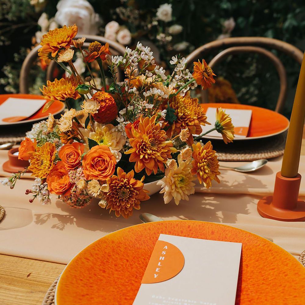 Bright orange wedding tablescape