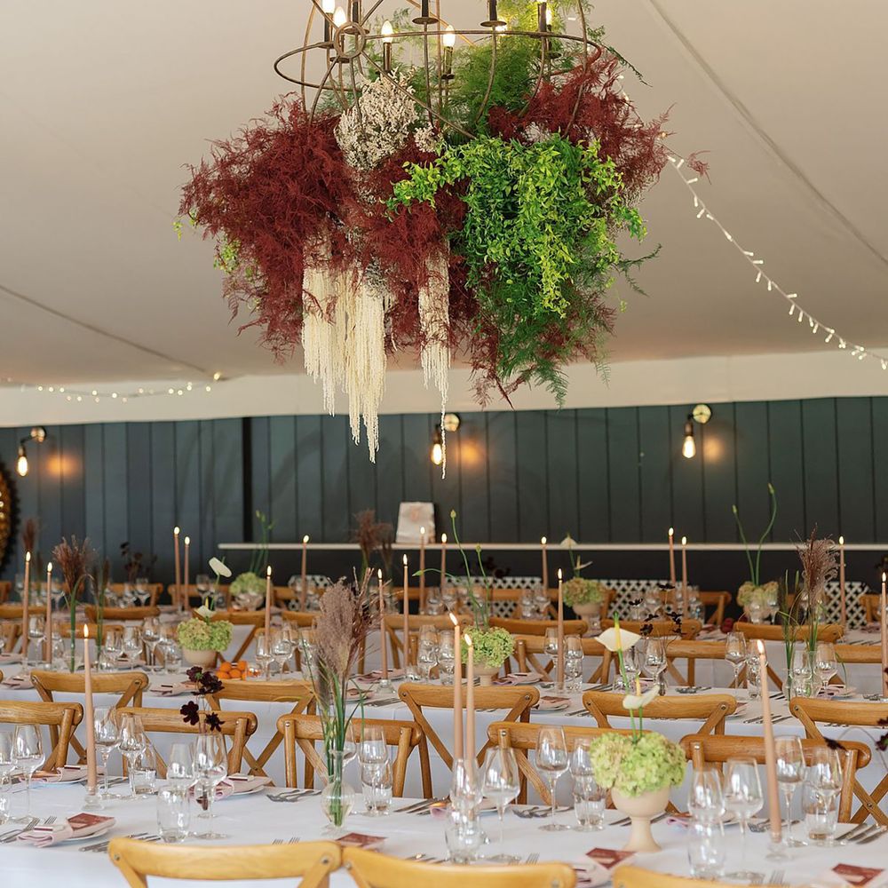 Burgundy and green hanging flower arrangement