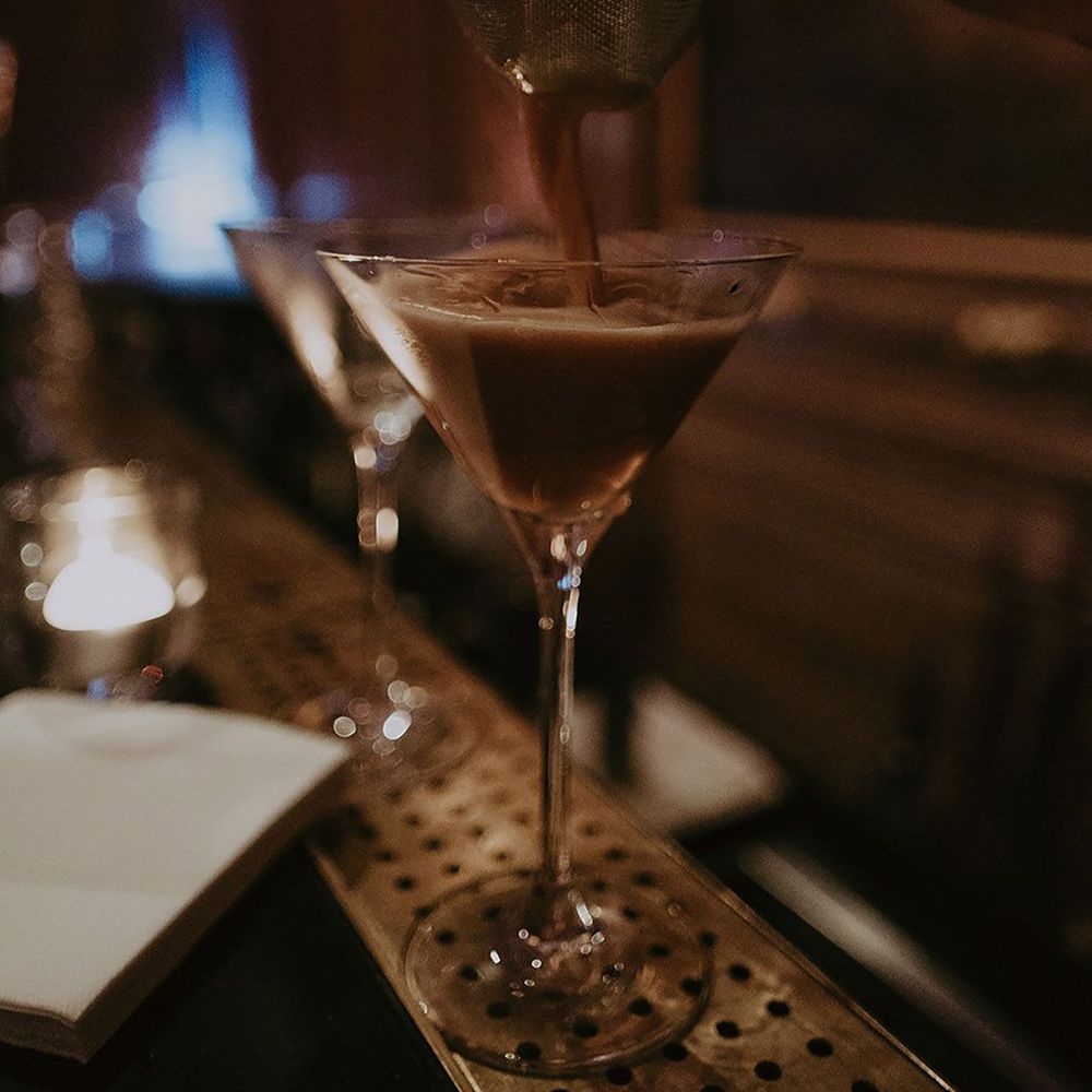 Espresso martini being made at wedding bar