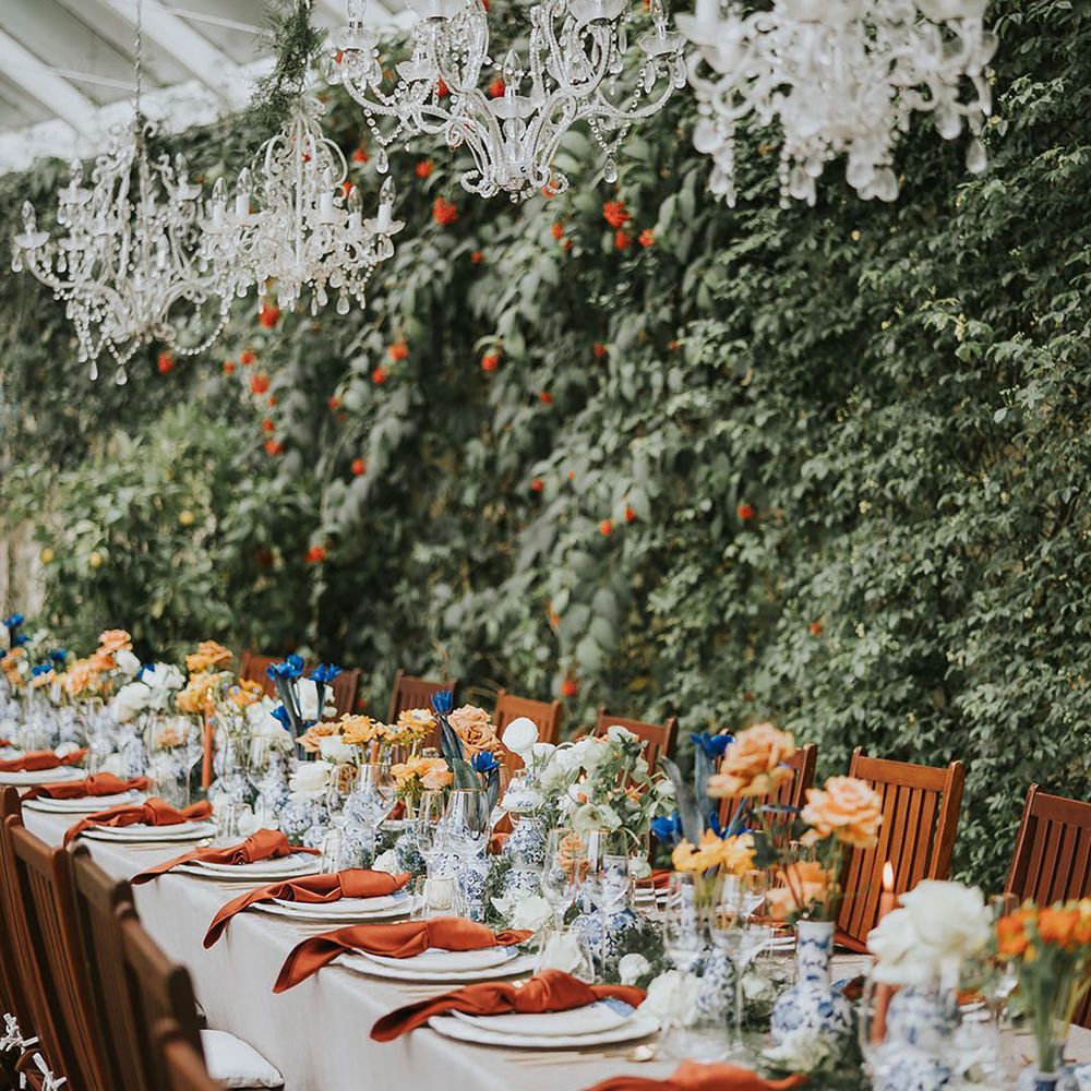 Orange and blue wedding tablescape