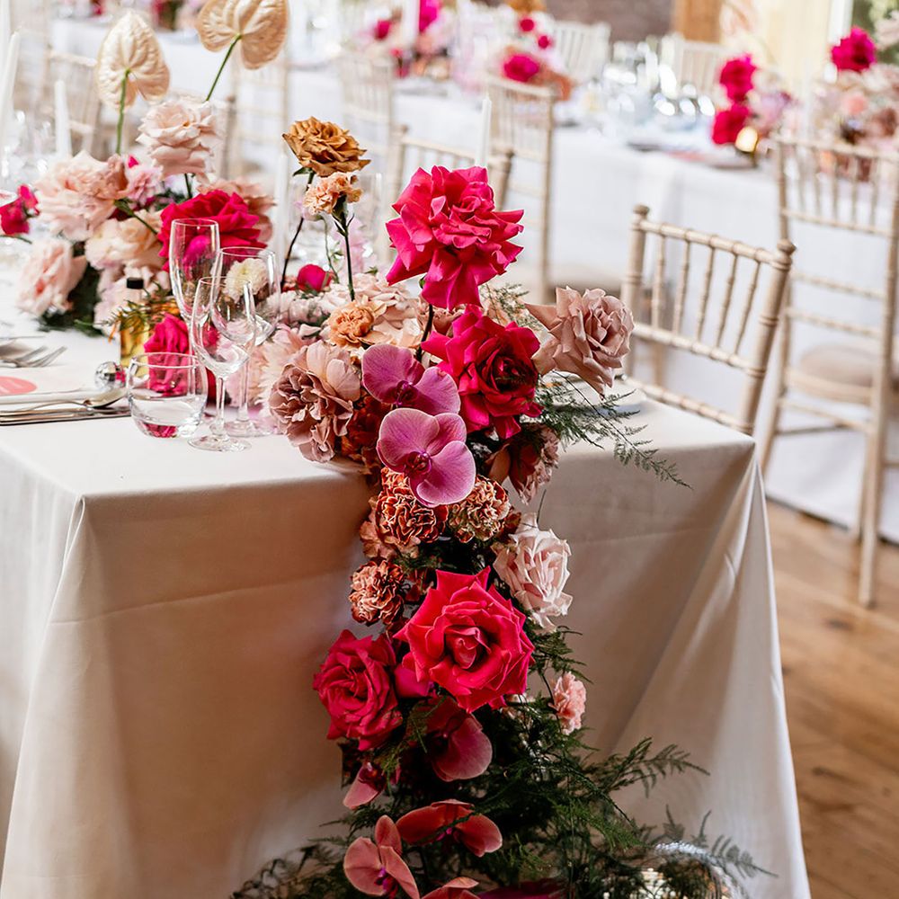 Pink waterfall wedding flower arrangement