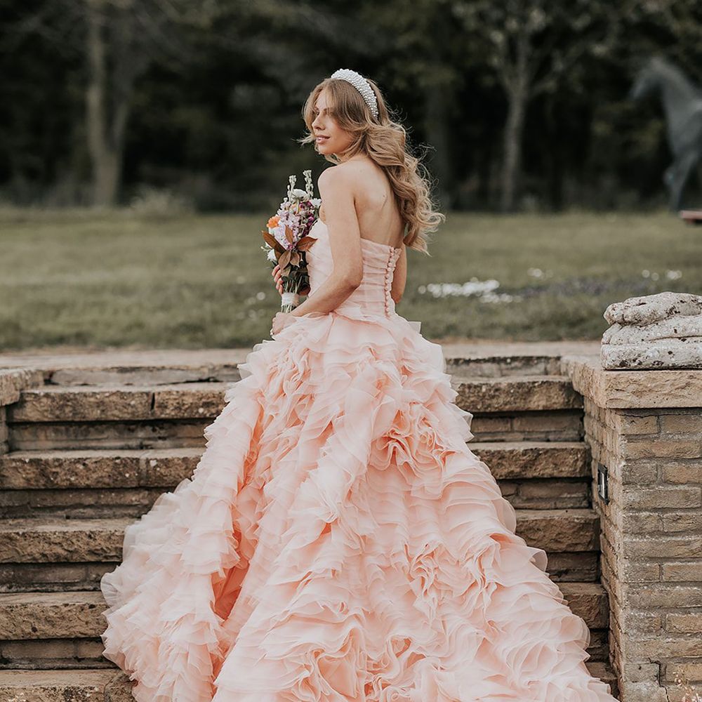 Ruffled peach wedding dress