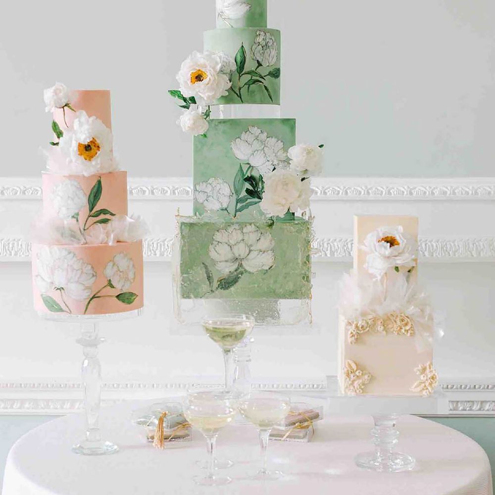 Sage green and peach floral tiered wedding cakes
