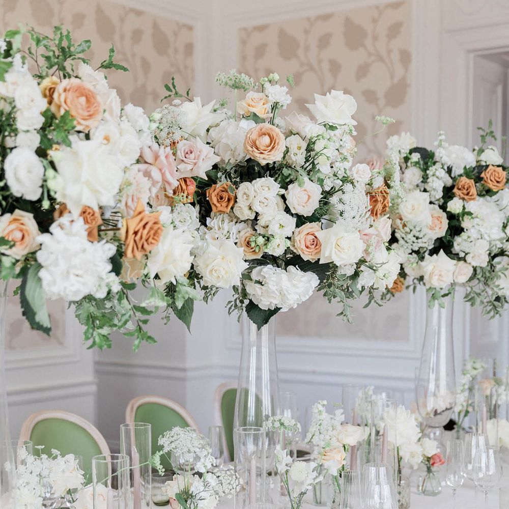 Sage green and peach floral wedding table decor
