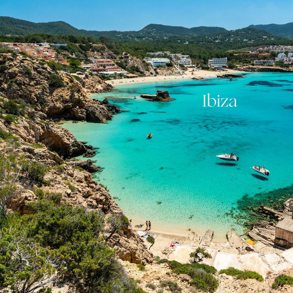 Ibiza beach with crystal clear turquoise waters hen do destination in Europe