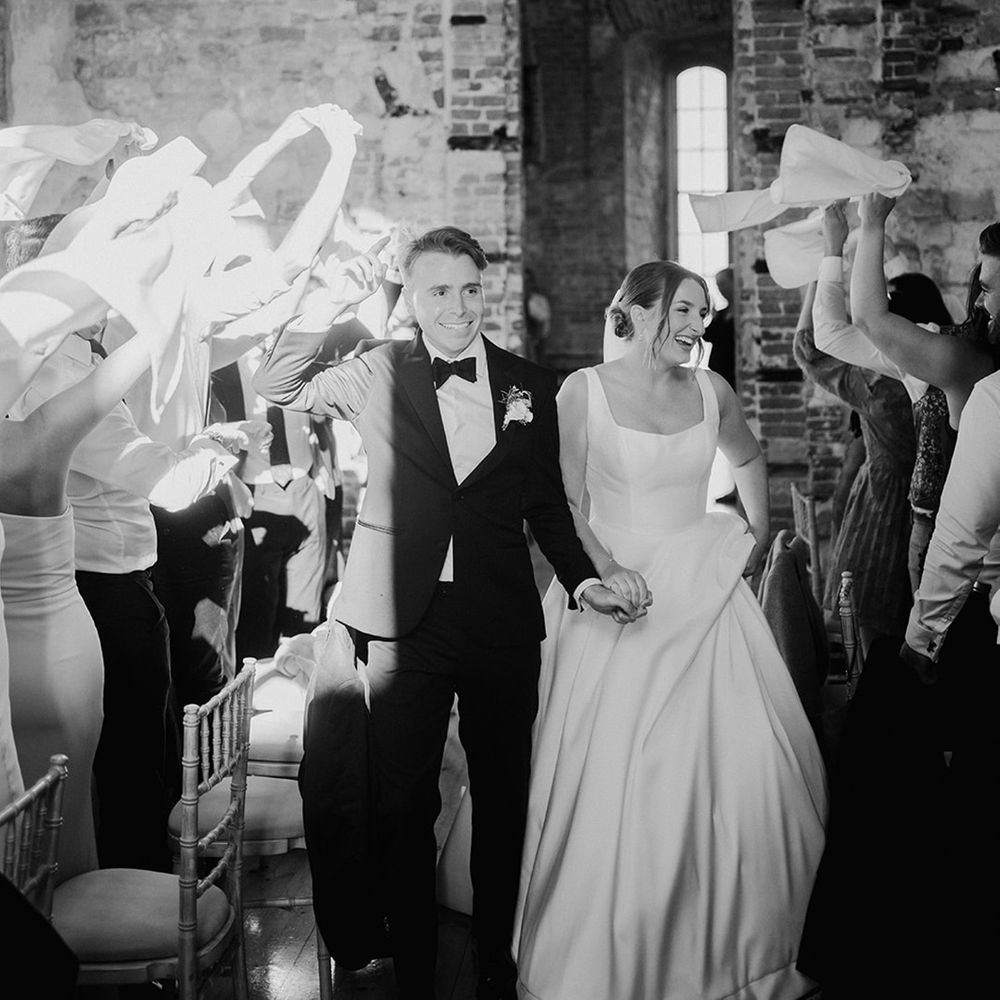 bride-and-groom-make-their-entrance-to-the-castle-wedding-reception