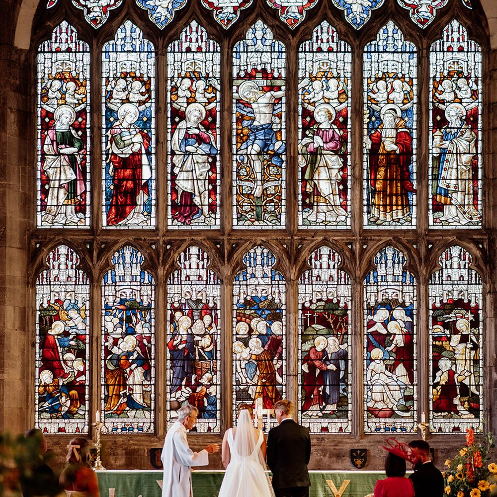 church-wedding-with-stained-glass-windows