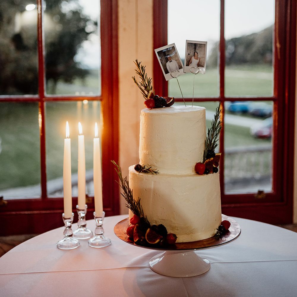 two-tier-buttercream-wedding-cake-with-dried-foliage