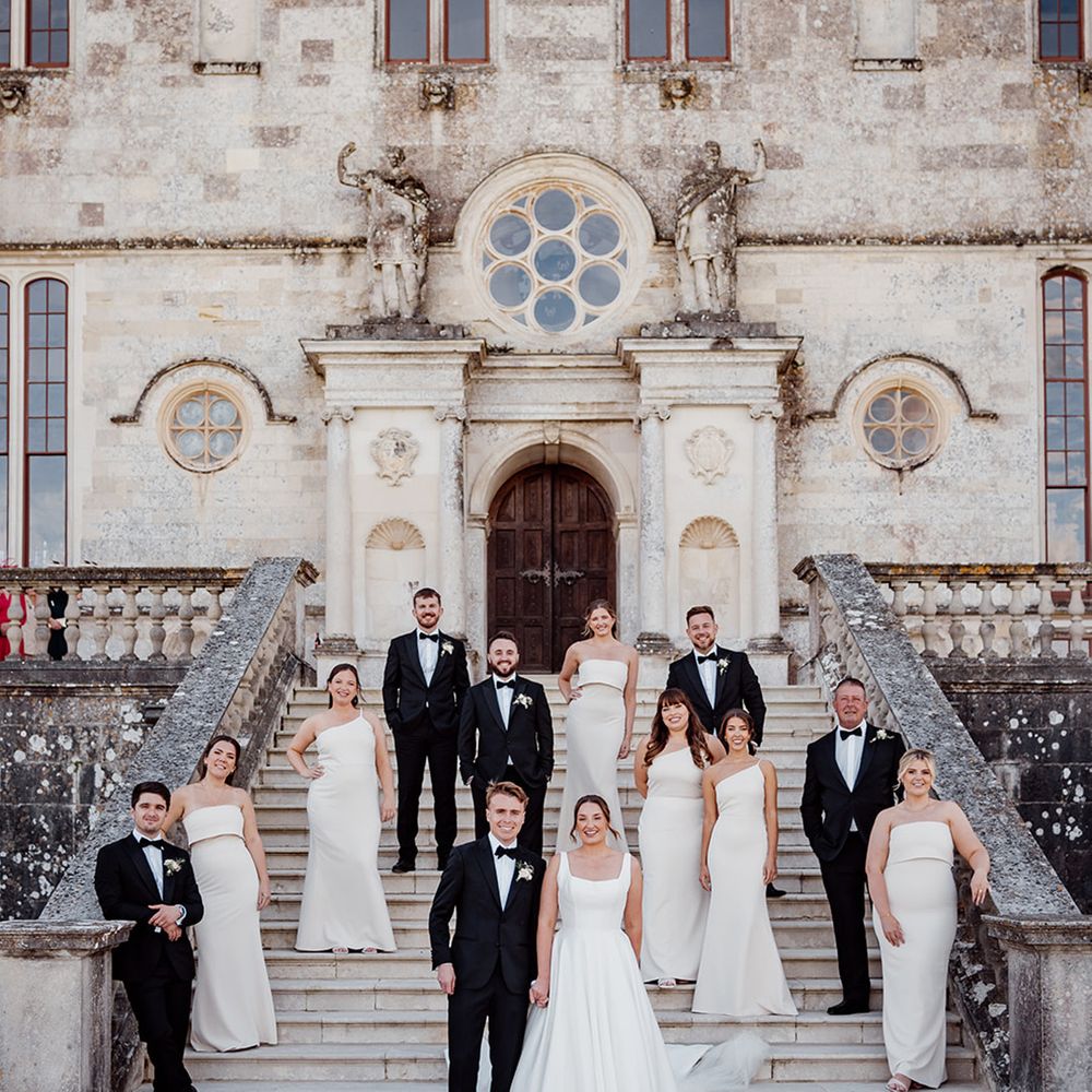 wedding-party-in-black-tuxedos-at-castle-wedding