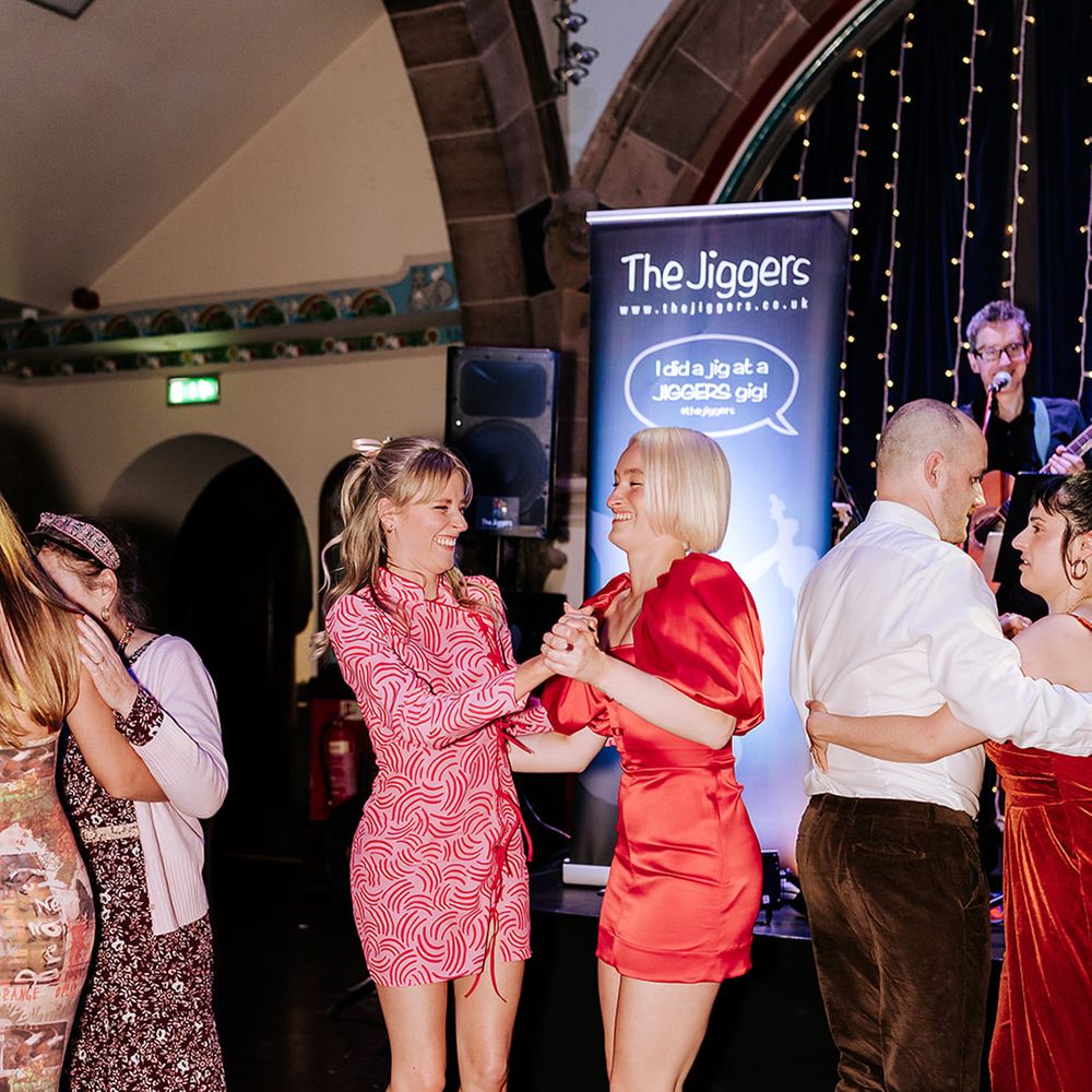 bridesmaids-dance-together