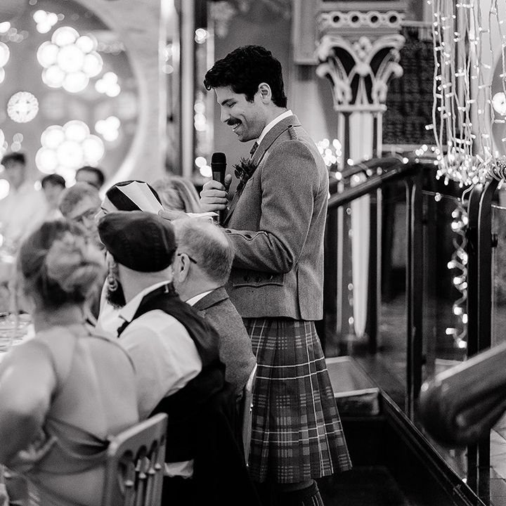 groom-reads-out-wedding-speech