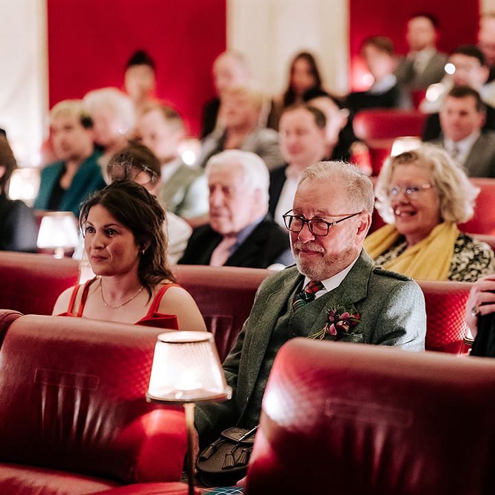 wedding-guests-seated-for-cinema-wedding