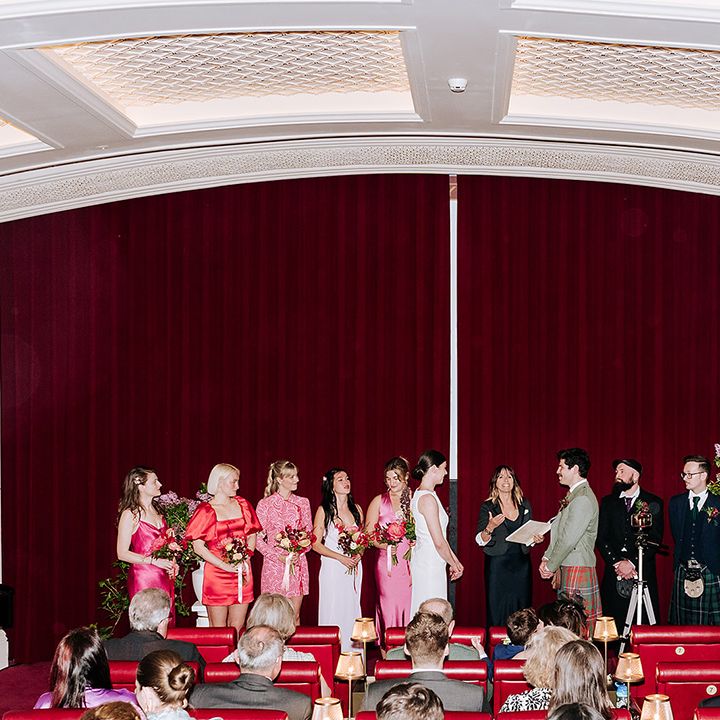 wedding-party-stands-for-ceremont-at-cinema-wedding