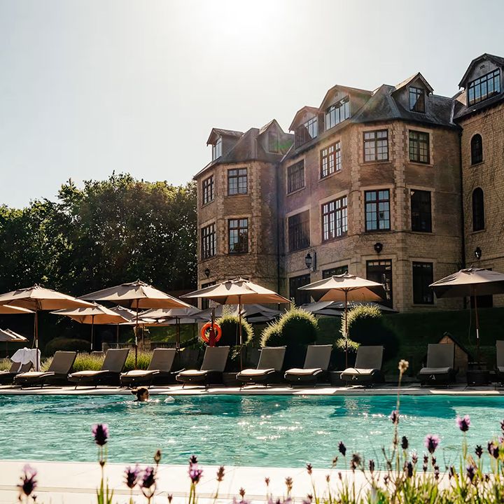 pennyhill park hampshire wellness retreat exterior building and pool area