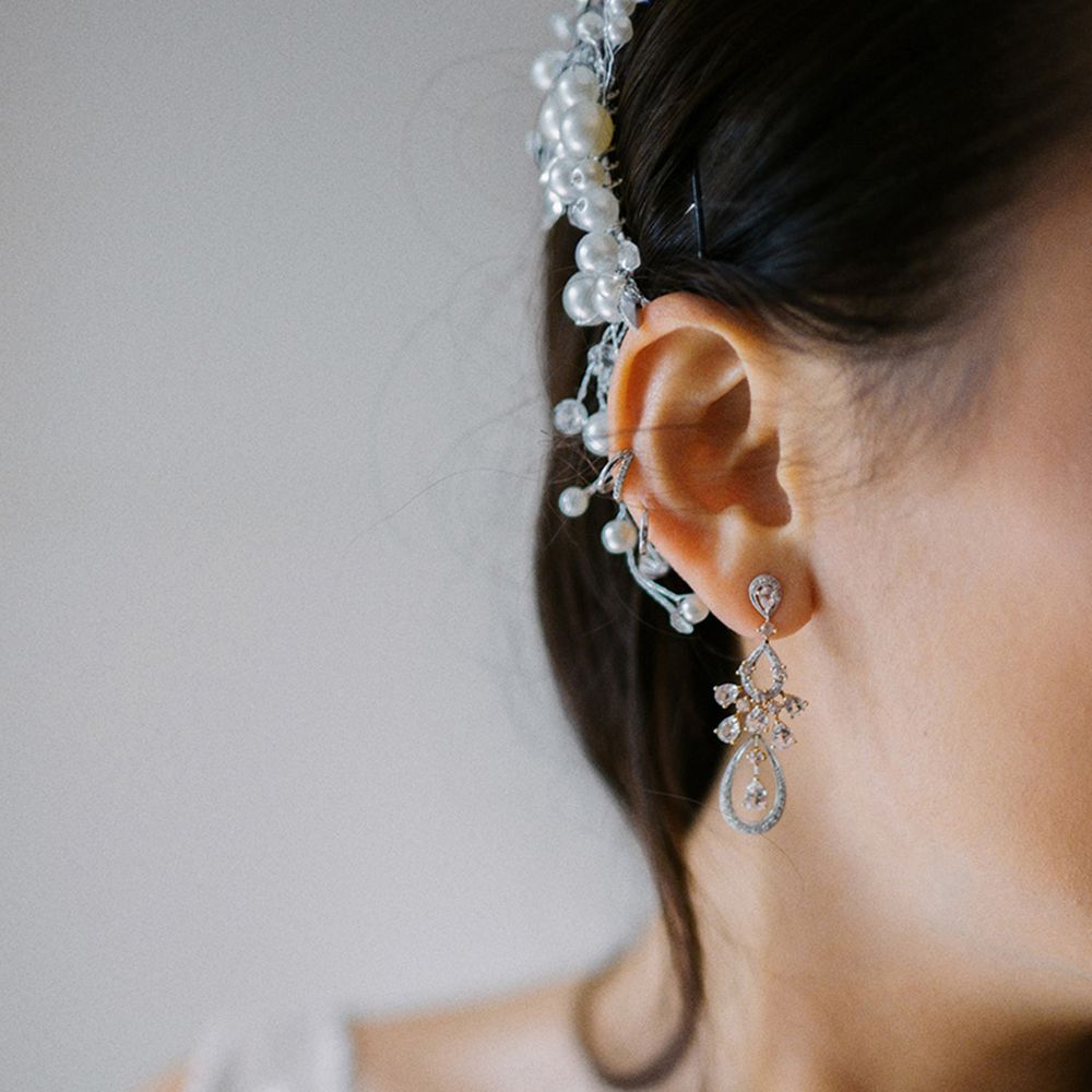 bride-with-silver-jewelled-wedding-earrings