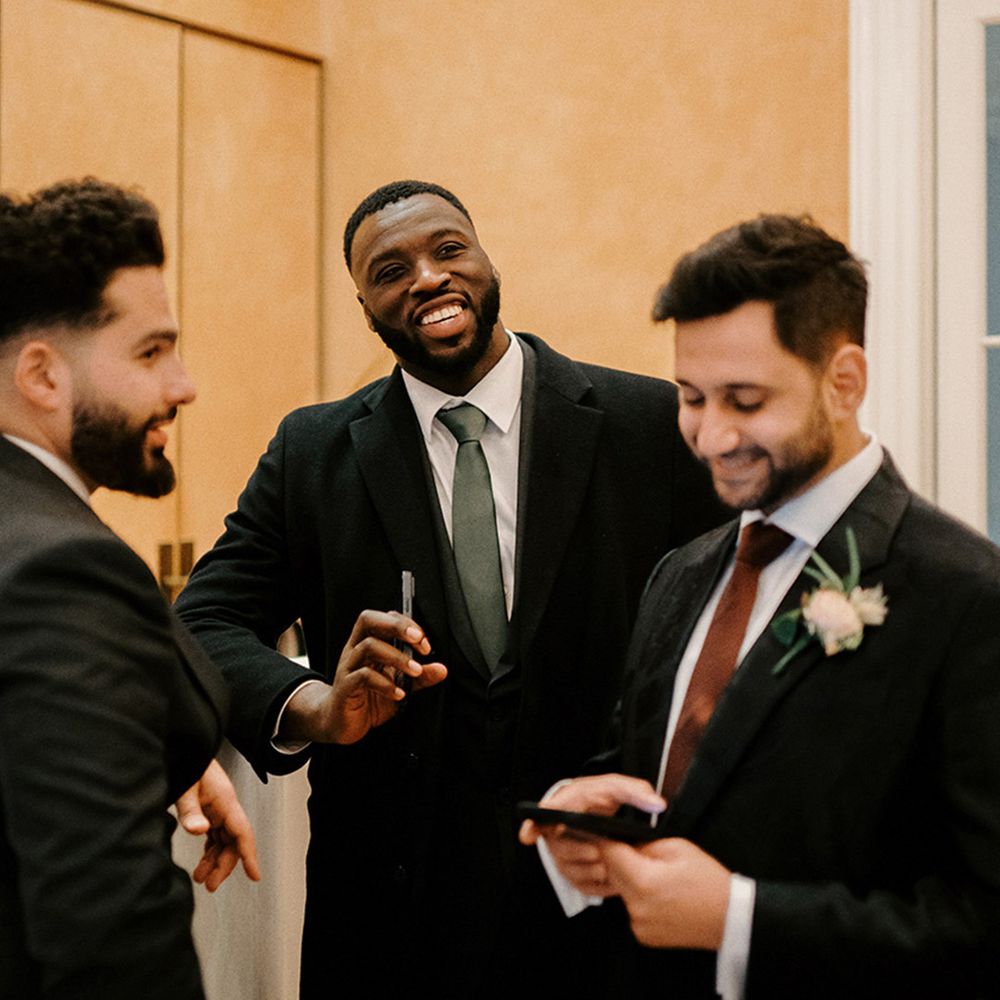 groom-stands-with-groomsmen