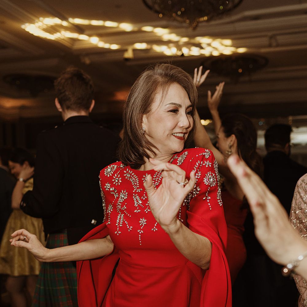 mother-of-the-bride-in-red-and-gold-dress