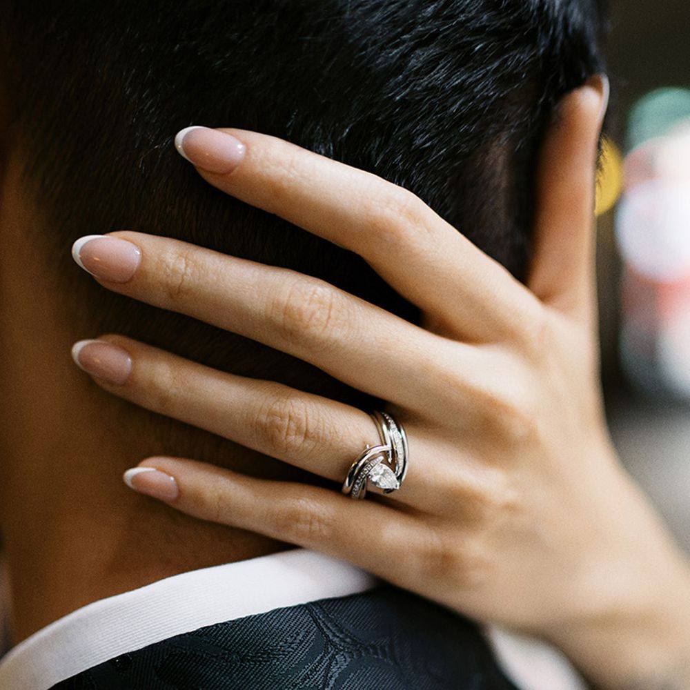 unique-silver-platinum-prong-engagement-ring-with-marquise-diamond