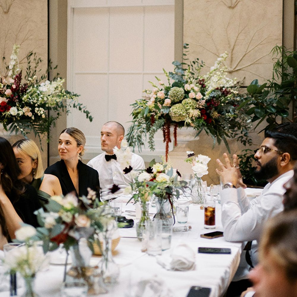 wedding-guests-listening-to-wedding-speeches