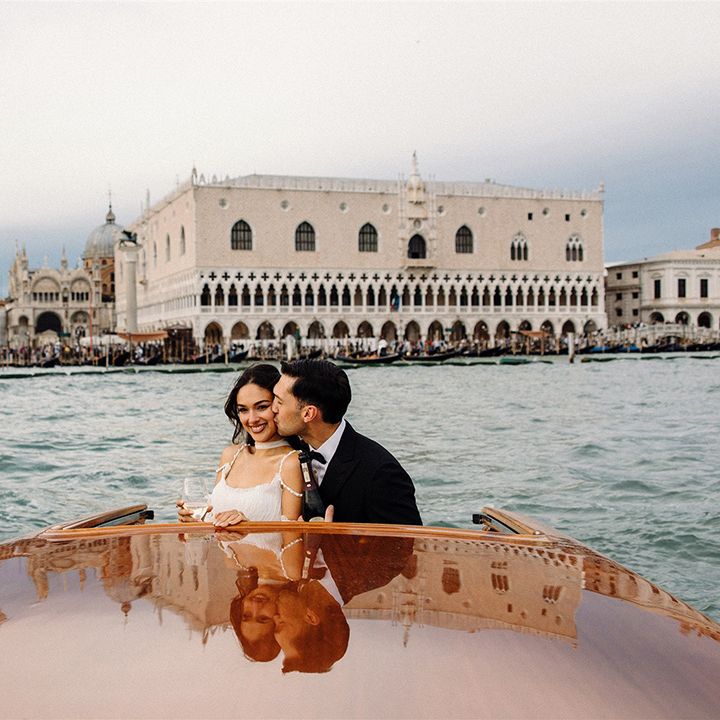 groom-kisses-bride-on-cheek-for-venice-wedding