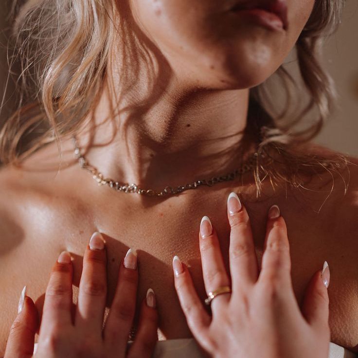 Bride Wearing White French Tip Classic Wedding Nails For Marquee Wedding