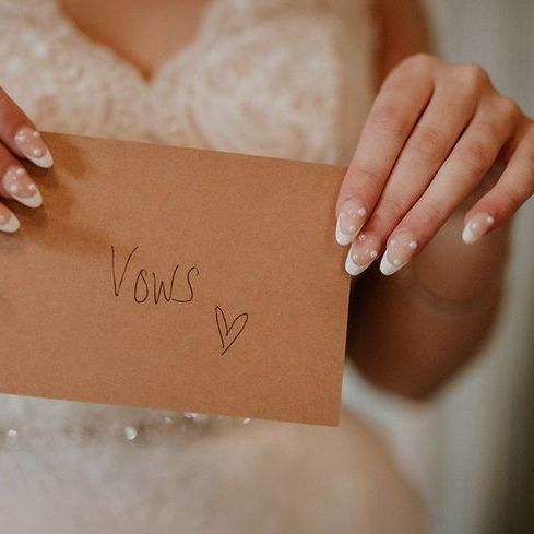 Bride With Classic French Tip Wedding Nails With Pearls