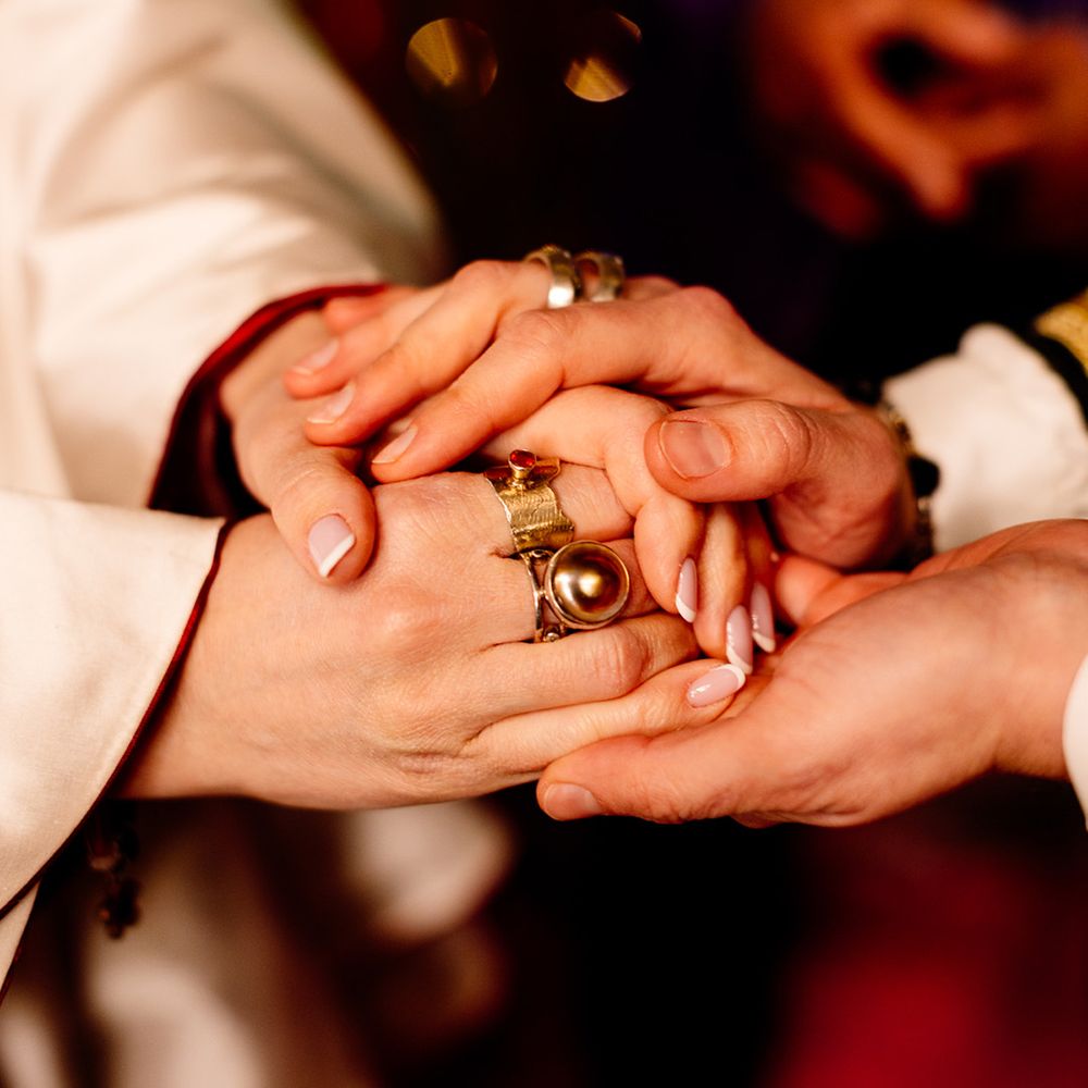 bride-holding-hands-during-ceremony