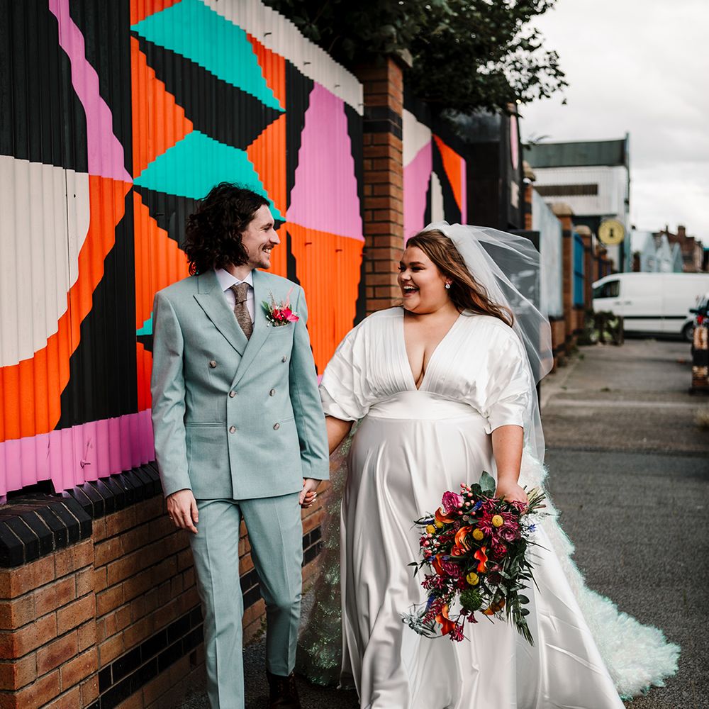 light-blue-double-breasted-groom-suit-and-short-sleeve-asos-wedding-dress