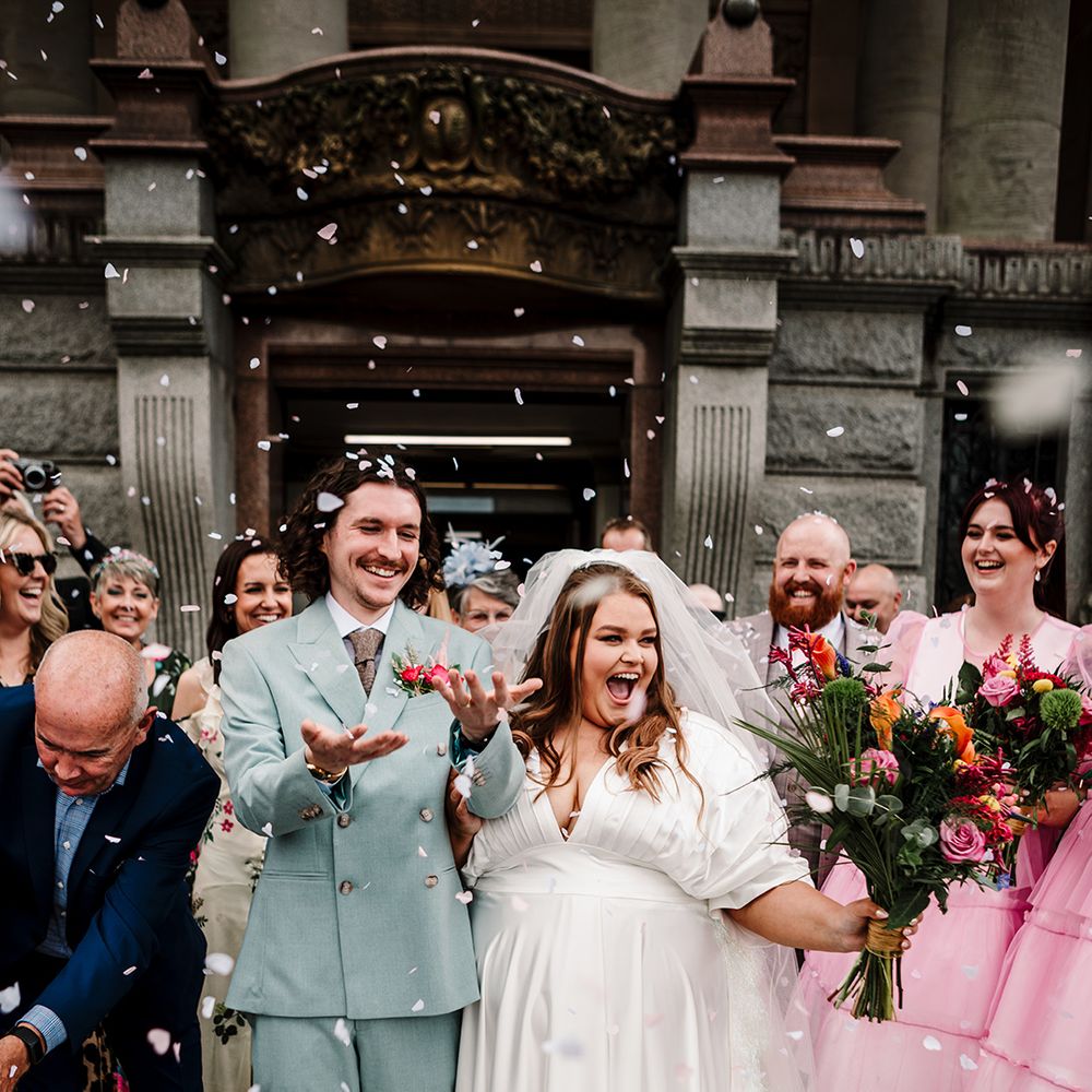 light-blue-wedding-suit-and-asos-wedding-dress-with-confetti-moment