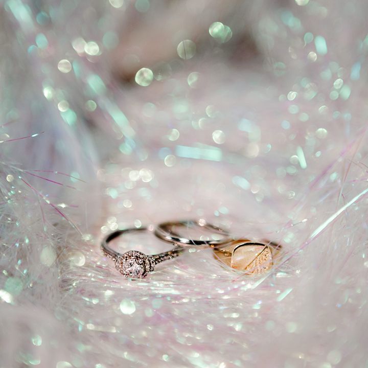 wedding-rings-on-holographic-tassels