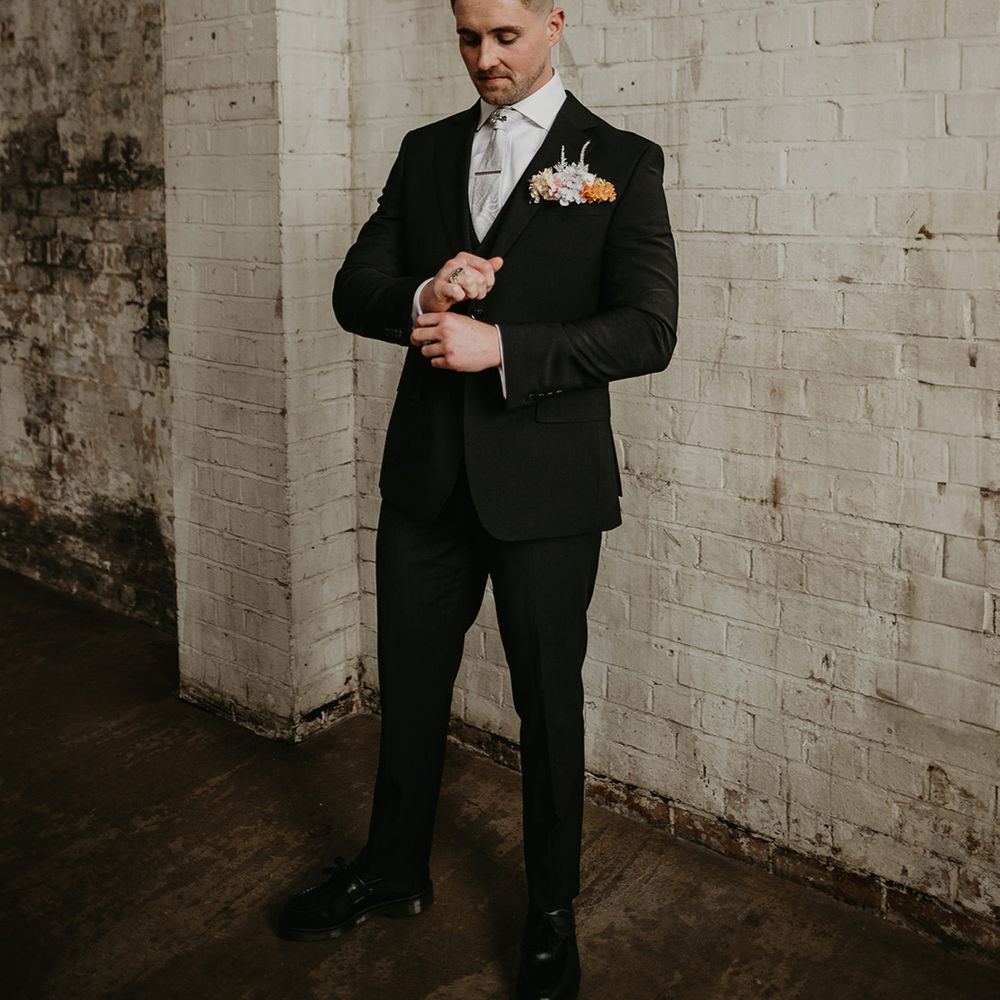 groom-in-black-suit