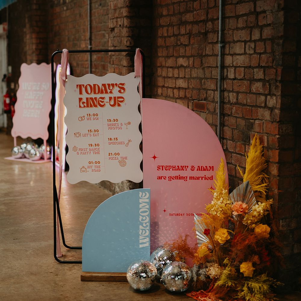 pink-and-blue-wedding-seating-plan-signage