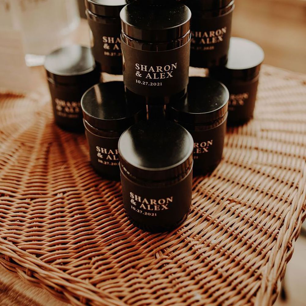 Black personalised candle wedding favours for guests