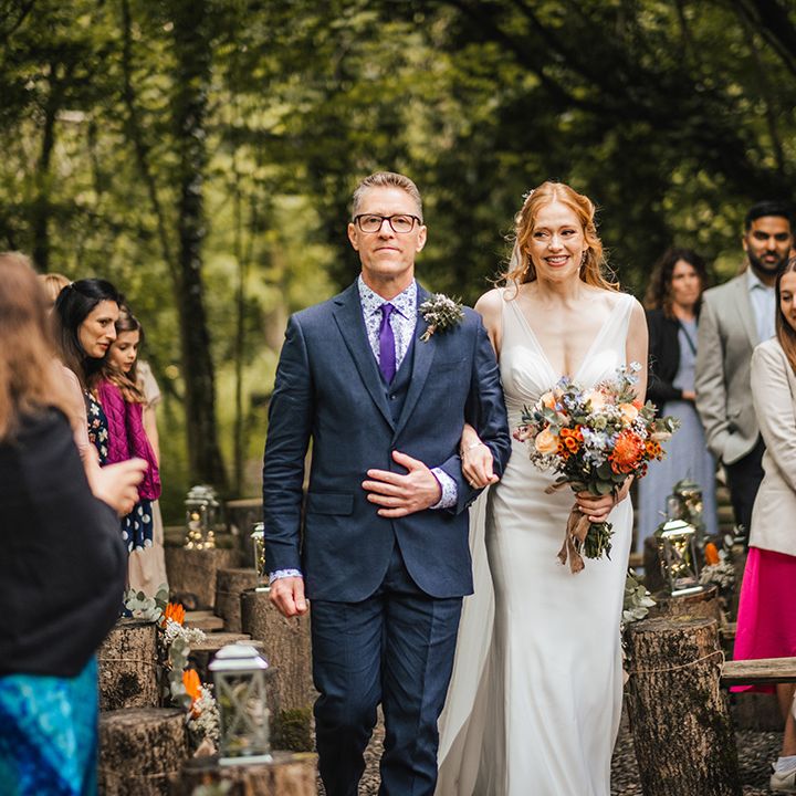 bride-and-father-of-the-bride-walk-down-the-aisle