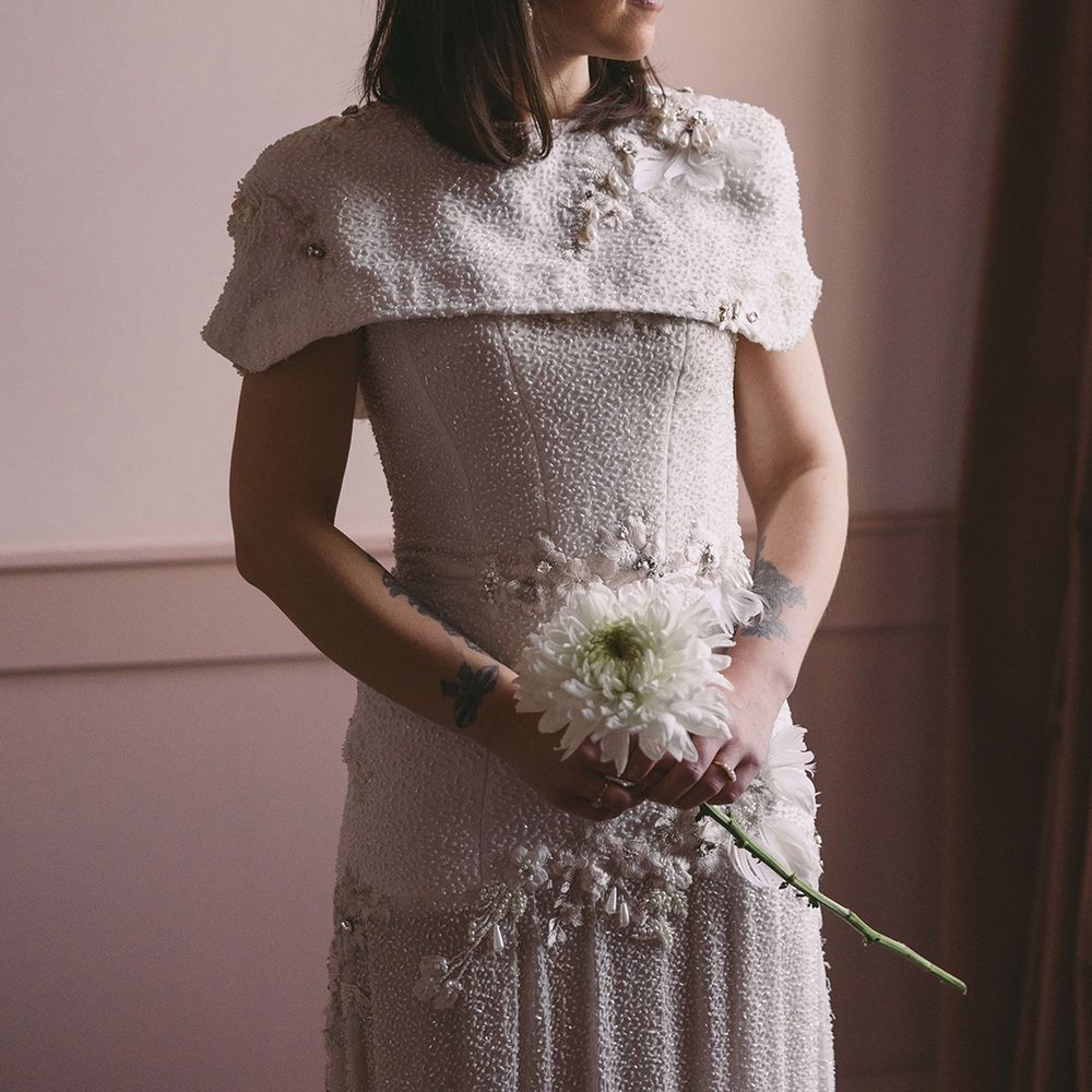 bride-wearing-pearl-wedding-dress