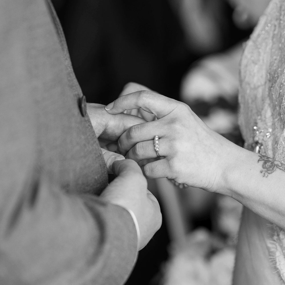 bride-wearing-pearl-wedding-ring