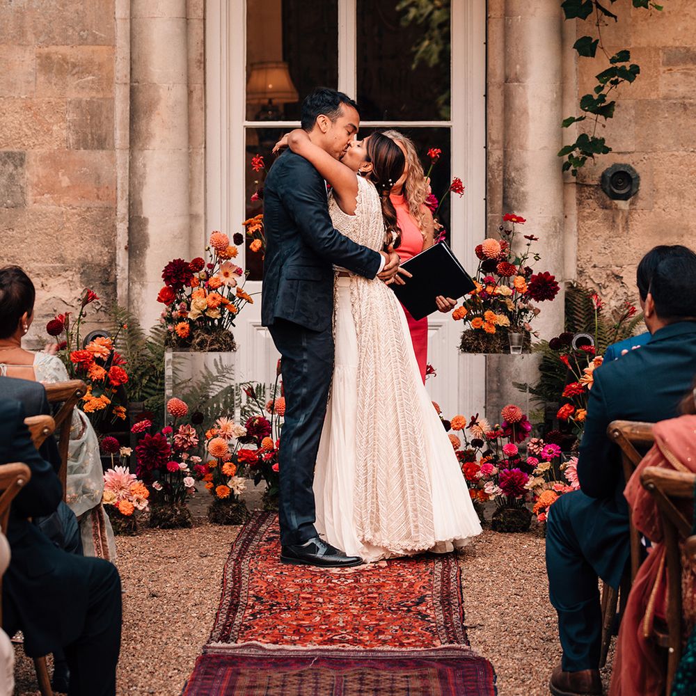 bride-and-groom-share-first-kiss-as-married-couple