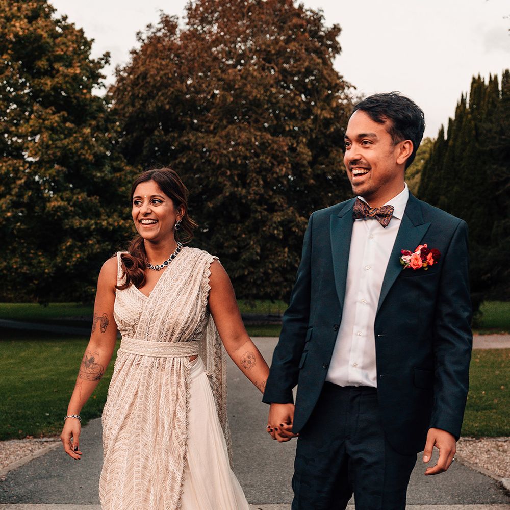 bride-and-groom-walking-and-smiling-together