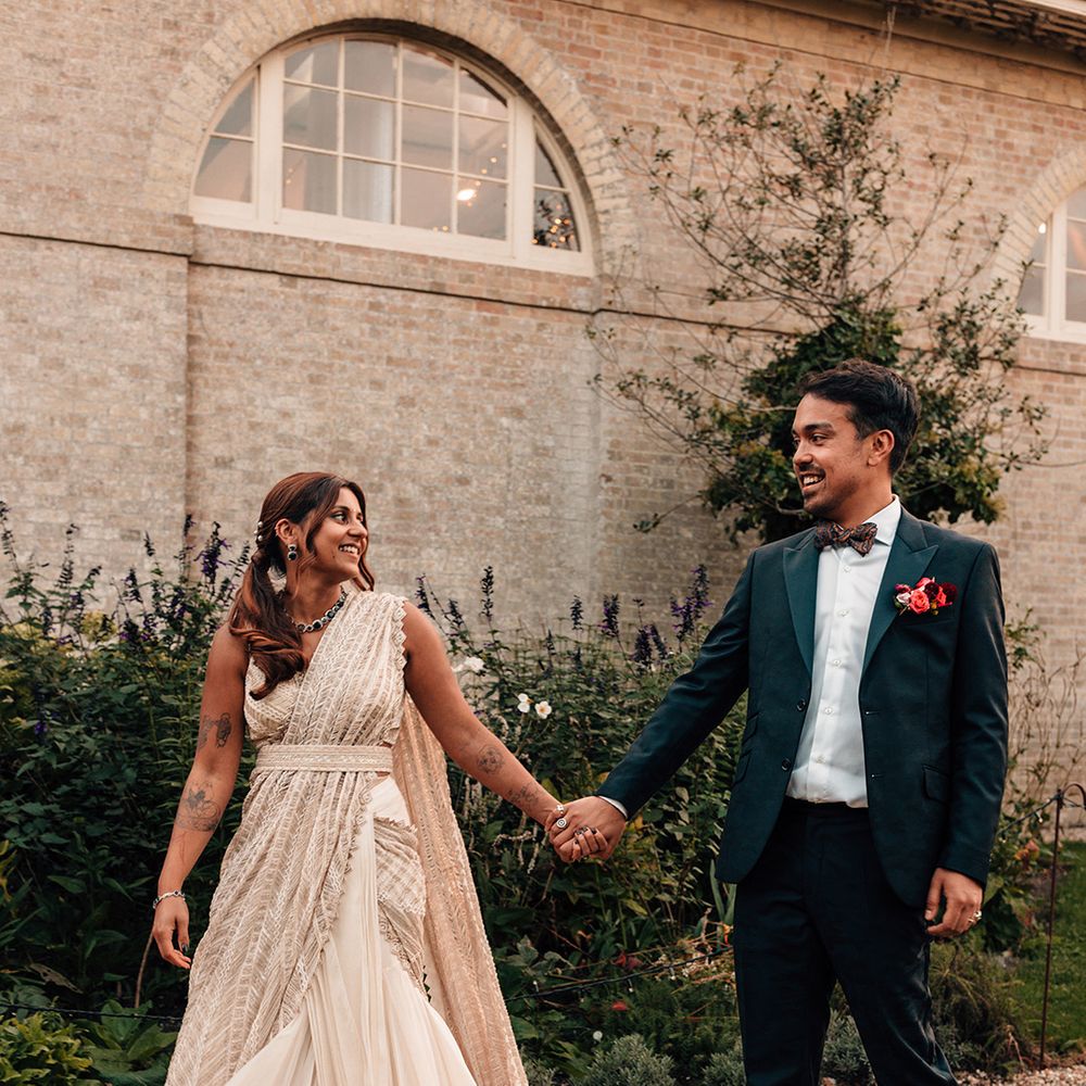 bride-and-groom-walking-hand-in-hand