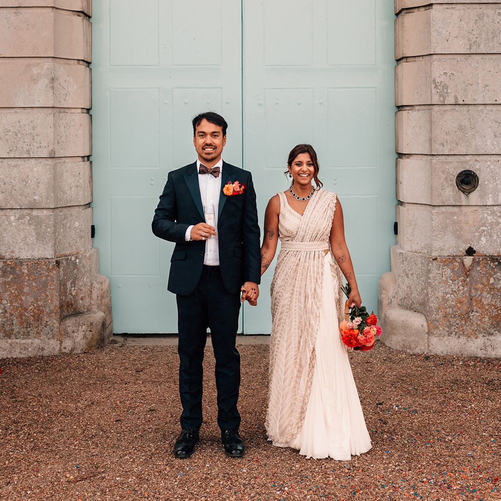 bride-in-sparkly-wedding-dress-with-groom-in-suit.