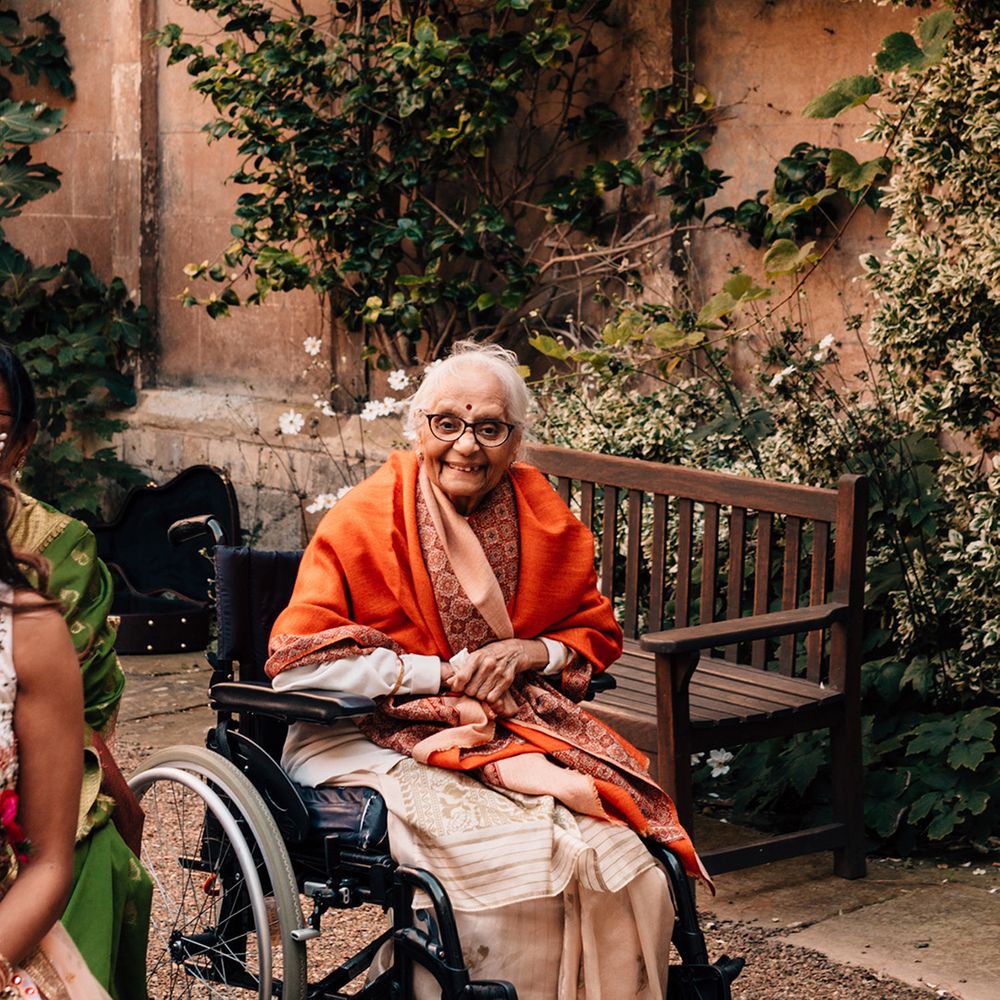 grandmother-sits-in-wheelchair-at-wedding-ceremony